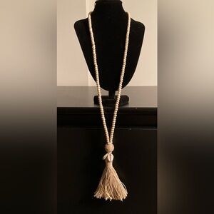 Elegant Beaded Necklace with Shell Pendant
